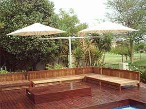 Dubble umbrella on wooden deck